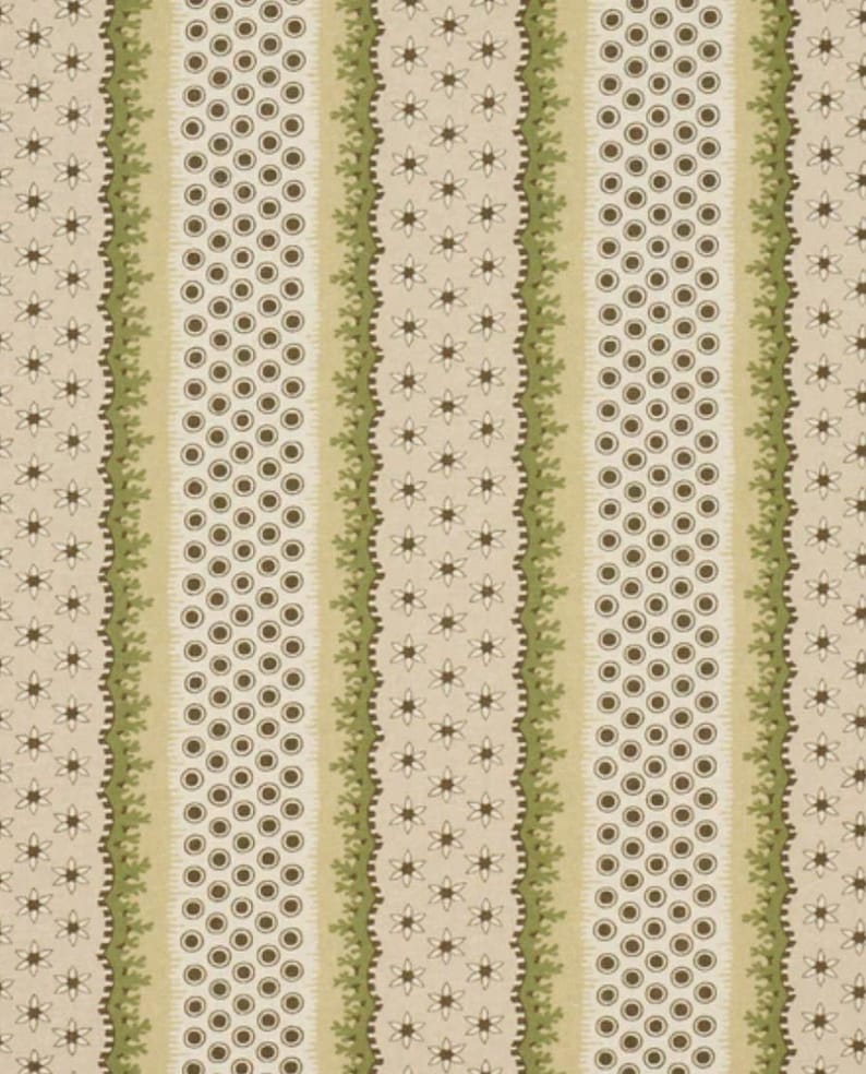 May include: A repeating pattern featuring vertical stripes. Alternating stripes include rows of brown circles, floral patterns, and a light green, scalloped border. The background is a light beige color.
