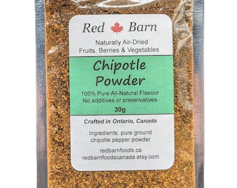 May include: A small pouch of Red Barn Chipotle Powder, a 100% pure all-natural flavoring. The pouch is made of clear plastic and contains 30 grams of powder. The label is green and white with the text "Red Barn" and "Chipotle Powder".