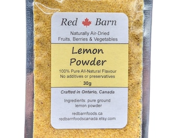 May include: A small pouch of yellow lemon powder, labeled "Red Barn Lemon Powder". The label says "Naturally Air-Dried Fruits, Berries & Vegetables", "100% Pure All-Natural Flavour", "No additives or preservatives", "30g", "Crafted in Ontario, Canada", "Ingredients: pure ground lemon powder", "redbarnfoods.ca", "redbarnfoodscanada.etsy.com".