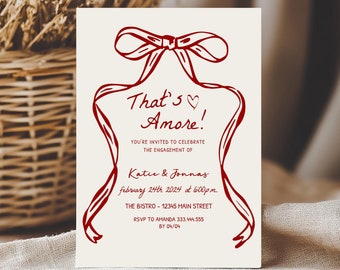 May include: A red and white engagement invitation with a red ribbon bow and the text "That's Amore!" You're invited to celebrate the engagement of Katie & Jonnas, February 24th 2024 at 6:00pm. The Bistro - 12345 Main Street. RSVP to Amanda 333.444.555 by 04/04.