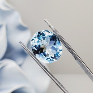 9.00ct Sky Blue Topaz 14x12mm Oval Loose Faceted Gemstone