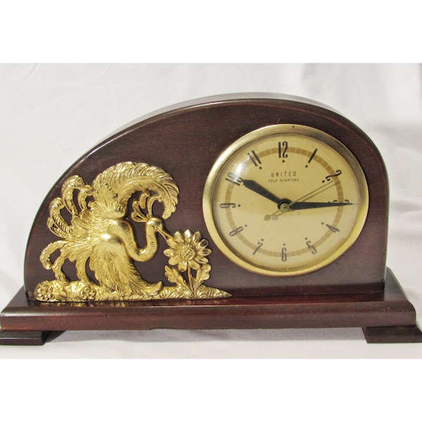 Vintage United Self Starting Walnut Mantel Clock Art Deco Brass Peacock, RARE All Original,110 Volt.