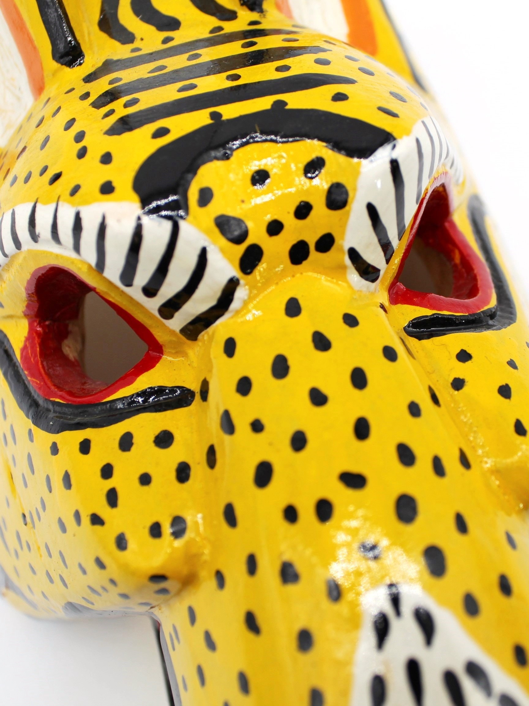 Vibrant Guatemalan Jaguar Mask: Hand-painted Wooden Folk Art for