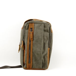 Canvas Sling Bag with Leather Trim, Wear over shoulder across the front or back.