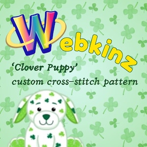May include: A Webkinz 'Clover Puppy' custom cross-stitch pattern. The image features a cartoon puppy with white fur and green clover accents. The background is a light green color with clover patterns. The Webkinz logo is at the top.