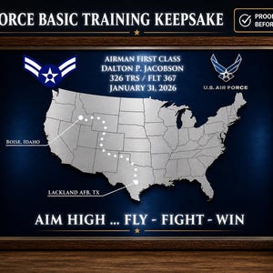 May include: Framed Air Force Basic Training Keepsake. Features a map of the United States with a highlighted route. Includes text: "Airman First Class Dalton P. Jacobson, January 31, 2026." The frame is brown, with a dark blue background.