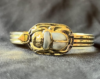 Light gray Brass Scarab Bracelet Egyptian Bangle with Pearl-Tone Beetle | Ancient Symbol Jewelry | Adjustable Hinged Cuff Made In Egypt
