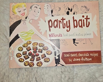 May include: A vintage rectangular cookbook titled Party Bait: Nestlé's 'tout sweet' hostess primer, featuring a pink cover with a stylized illustration of a person holding a platter of chocolate treats and text by Jane Fulton.