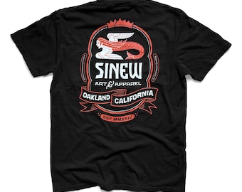 May include: Black t-shirt with a red and white graphic. The graphic features a mermaid design with the text "SINEW ART & APPAREL OAKLAND CALIFORNIA" and "EST. MMXXIV". The design is in a circular emblem.