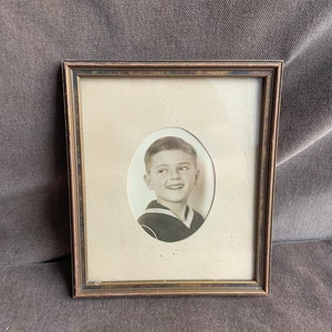 Vintage Framed Black and White Oval Photograph of a Young Boy