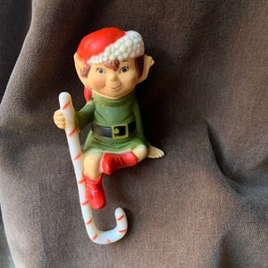 Vintage Plastic Pixie Sitting Elf with Candy Cane