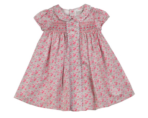 Robe petite fille en satin de coton à fleurs orange rose smocké à