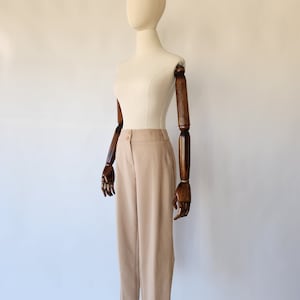 vintage khaki women&#39;s pants with front button and zipper closures