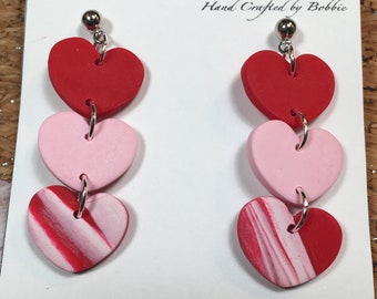 Handmade, Polymer Clay, heart shape, pink and red and marbled colored dangles, in silver,  Valentines day, Statement Earrings