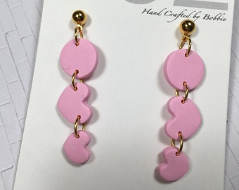 Handmade, Polymer Clay, heart shape, pink colored dangles, in gold,  Valentines day, Statement Earrings