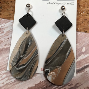 Handmade, Polymer Clay, unique, black, gold and white, marbled colors. dangle, in silver, Statement Earrings