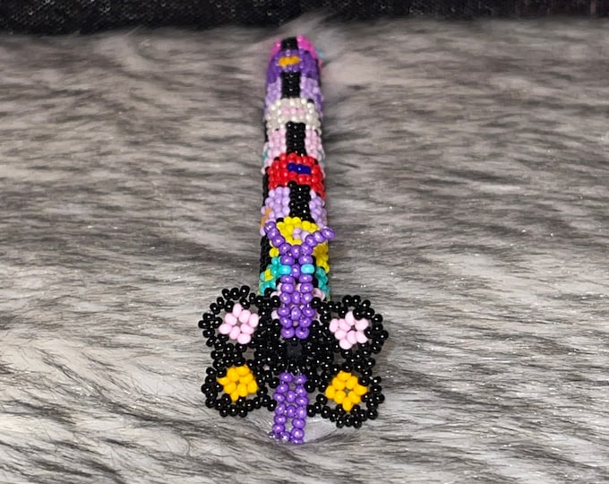 Pencil case with handmade embroidered cover