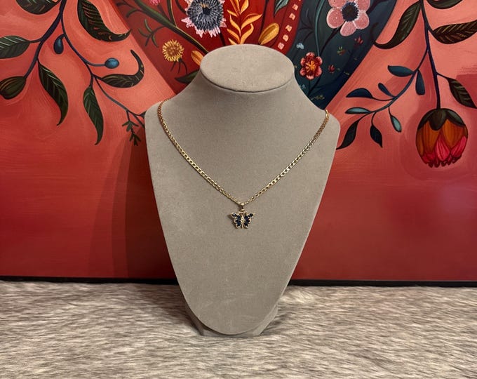Necklace with butterfly pendant