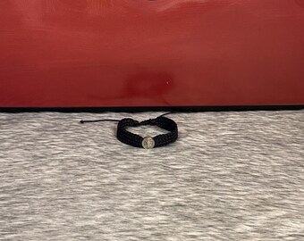 Woven bracelet of Saint Benedict