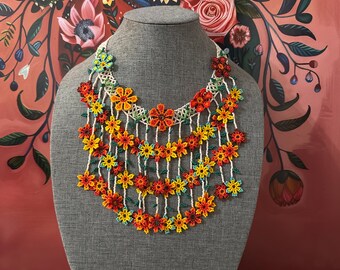 Floral-inspired necklace, earring, and bracelet set