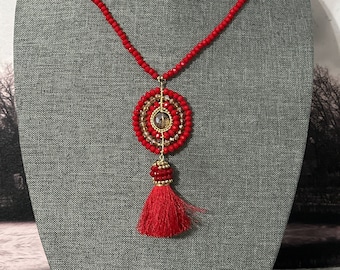 Crystal necklace and earrings set with silk speck