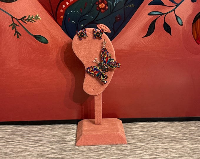 Butterfly earring and pendant set in 925 sterling silver.