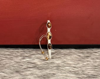 Macrame style woven bracelet with amber