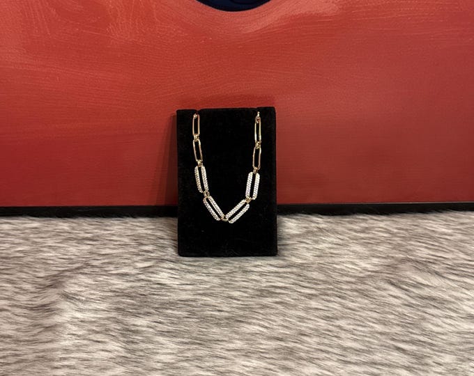 Bracelet with links and cubic zirconia