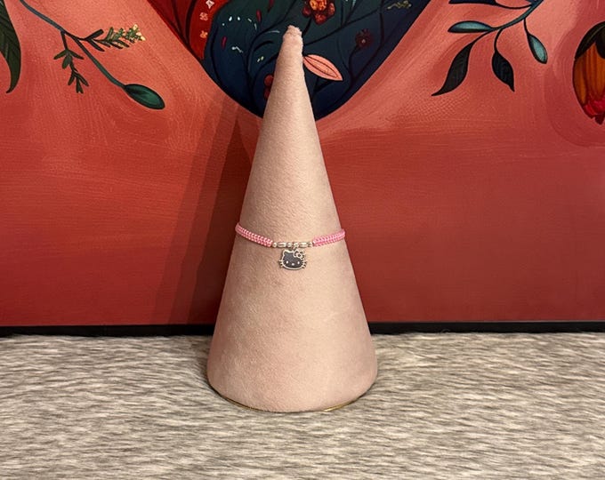 Thread bracelet with Hello Kitten pendant