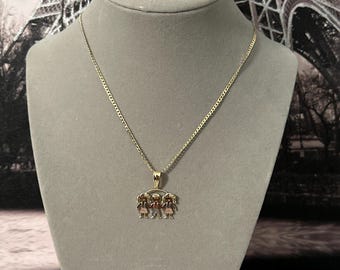 Necklace with pendant of 2 girls and 1 boy