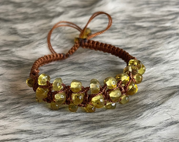 Adjustable macramé style bracelets with amber