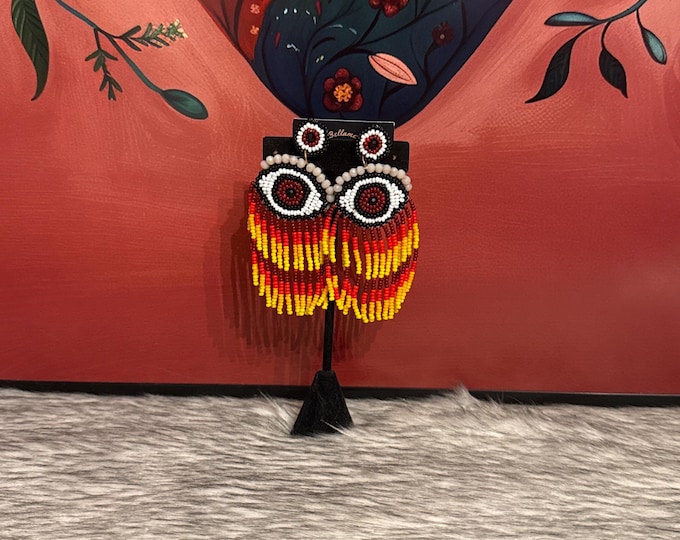 Protective eye earrings