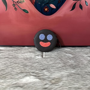 Geldbörse mit Clown-Palette