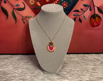 Necklace with Mexican doll pendant