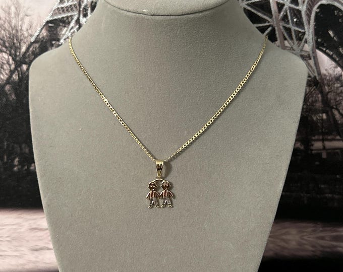 Chain with pendant of 2 children
