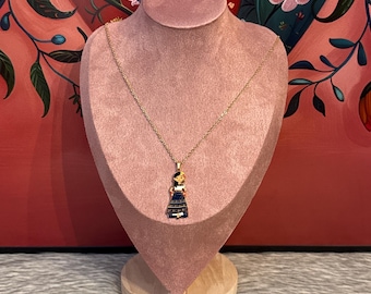 Necklace with Mexican doll pendant