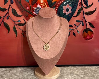 Gold choker with a small medal of the Virgin of Guadalupe