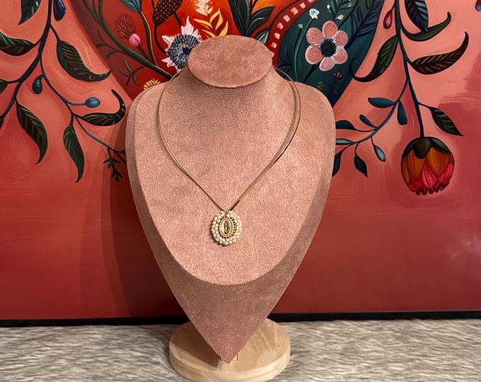 Gold choker with a small medal of the Virgin of Guadalupe