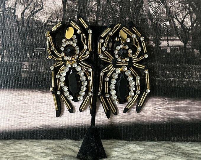 Magic spider earrings