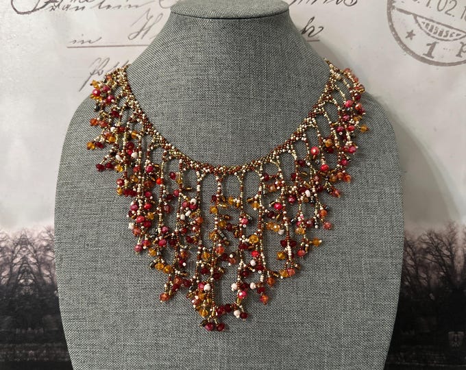 Set of necklace with earrings and bracelet roots