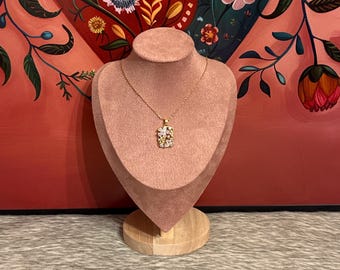 Necklace with flower pendant with cubic zirconia