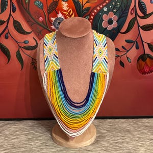 Ketting en oorbellen met engelenvleugels afbeelding 4