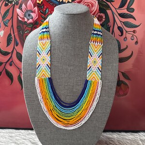 Ketting en oorbellen met engelenvleugels modelo 2