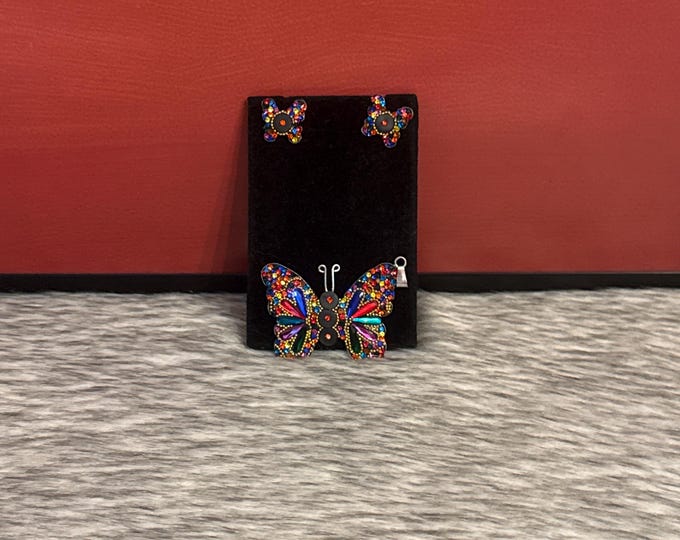 Butterfly earring and pendant set in 925 sterling silver.