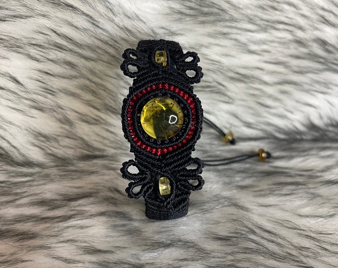 Woven bracelet with amber