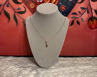 Necklace with child pendant