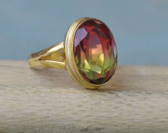 Anillo de turmalina bicolor: relleno de oro de 14 quilates y plata de ley.