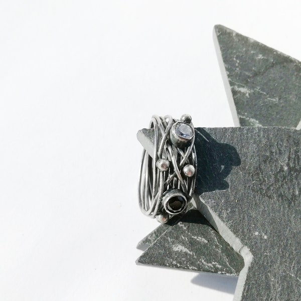 Tangled SILVER RING with two ZIRCONIA handamade. Silver tangled ring with two handmade zirconite.