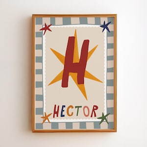 May include: A framed wall art print featuring a large red letter H centred over a yellow star shape on a beige background. The name HECTOR is printed below in multicoloured letters. The border has a blue and white checkered pattern with four small starfish.