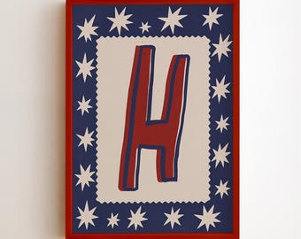 May include: A framed print with a red letter "H" outlined in blue on a cream background. The letter is inside a cream rectangle, framed by a navy border with white stars, all within a red frame. The print is suitable for a child's room.